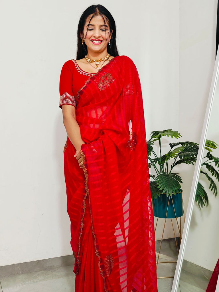 Regal Red Jimmy Choo Saree with Diamond-Studded Peacock Buttas & Wavy Designer Border