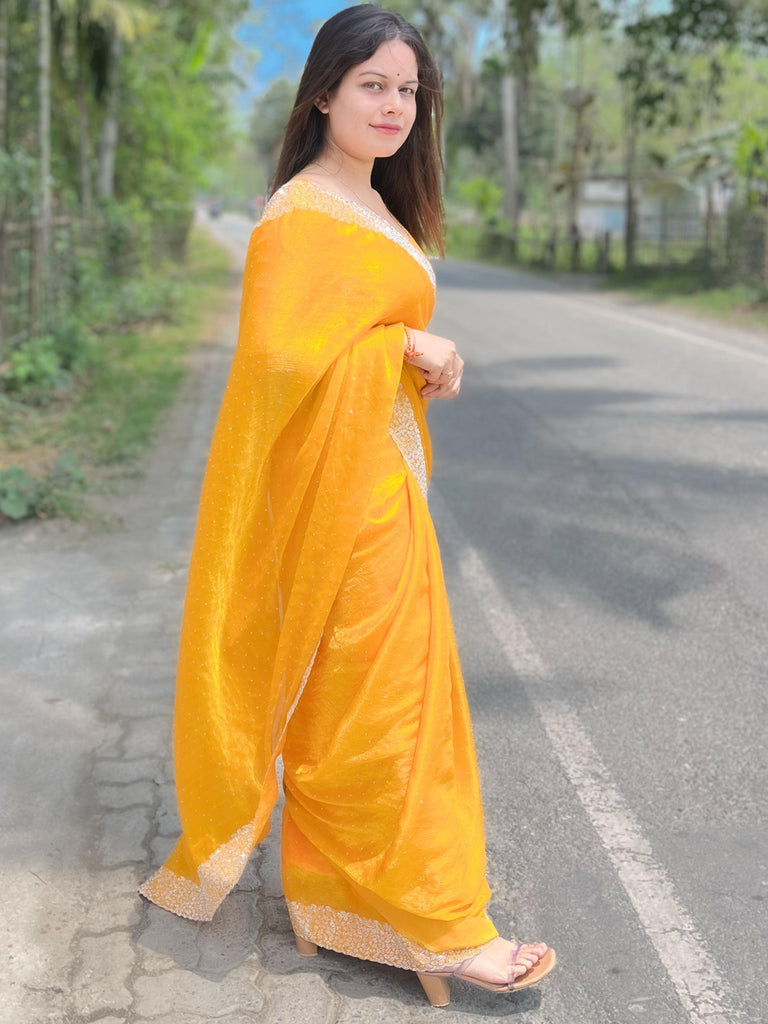 Fendy Silk Saree in Yellow with Scattered Diamond and Lace Border