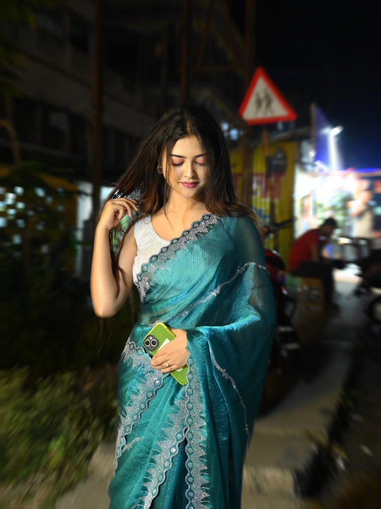Stunning Teal Ethnic Saree with Glimmering Diamond Line Patterns