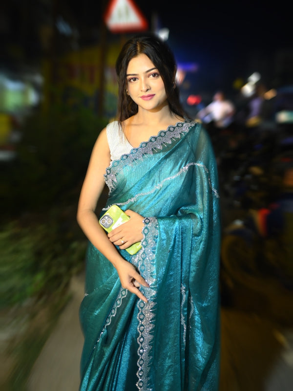Stunning Teal Ethnic Saree with Glimmering Diamond Line Patterns